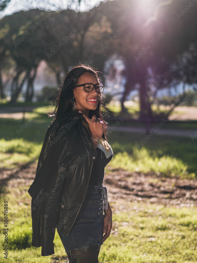 posing in a park with beautiful light posing in a park with beautiful light