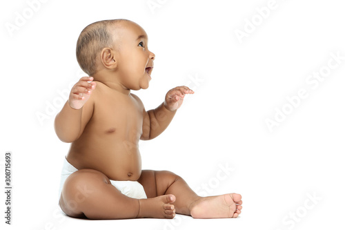 Bild auf Leinwand American baby girl sitting on white background