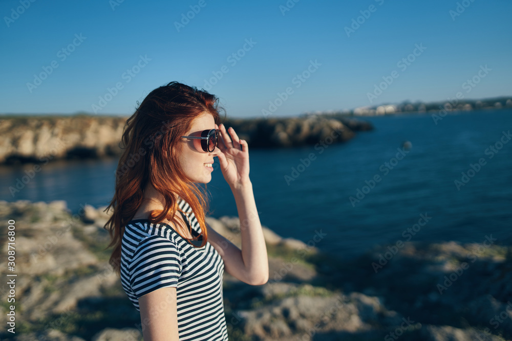 woman with mobile phone on the beach woman with mobile phone on the beach