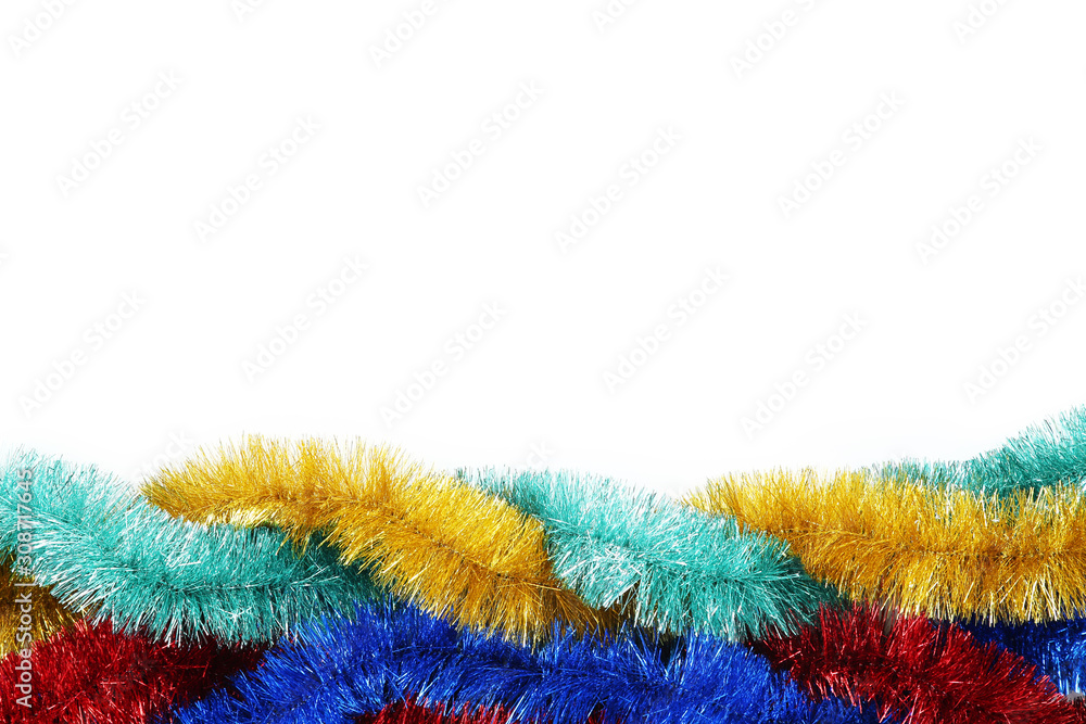 Colorful christmas tinsel on white background