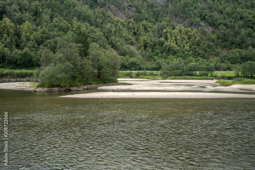 Fototapeta Naklejka Na Ścianę i Meble -  shoals at river in woods, near Evanger , Norway