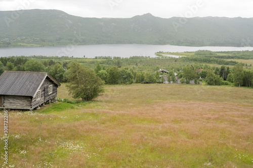 house on green slope in countryside, near Geilo, Norway