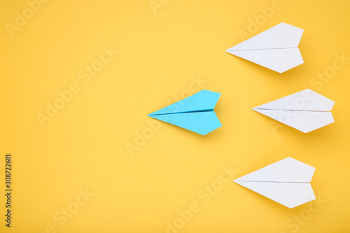 Free Download Paper plane leader on yellow background - GFXLoad