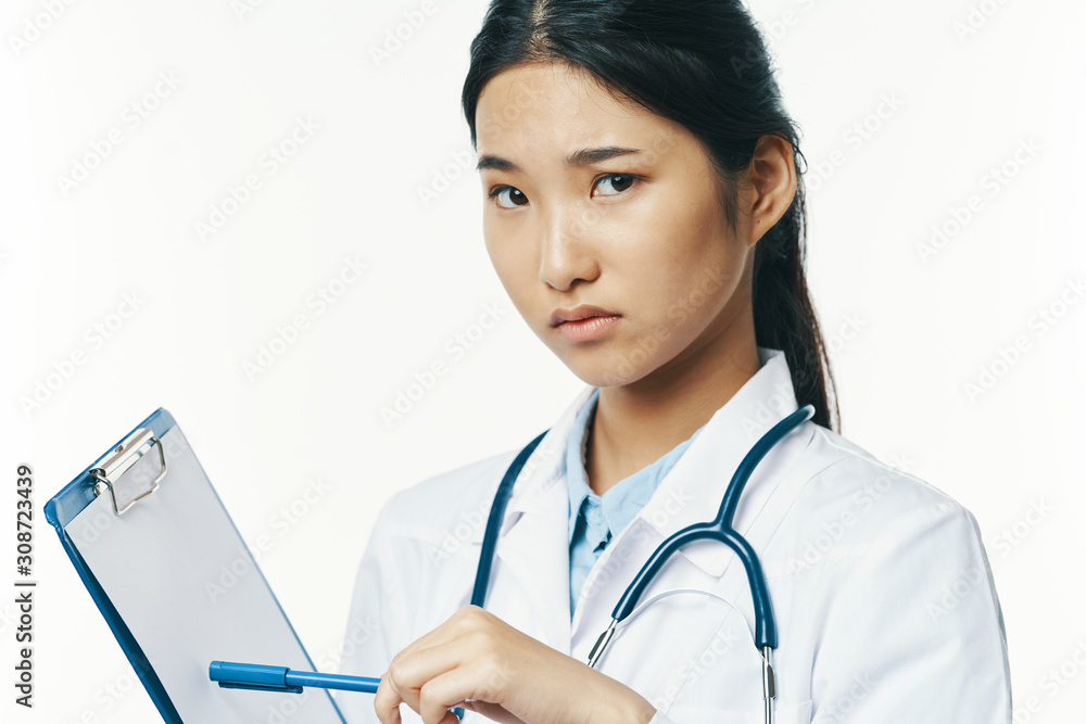 portrait of a female doctor with stethoscope portrait of a female doctor with stethoscope