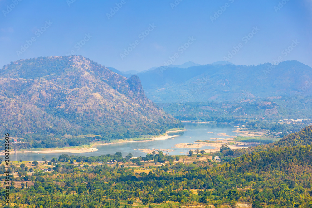 Beautiful panoramic view of Mae Khong river Mountain views of Laos with Chiang Khan town on Phu Thok Park in Loei province,Thailand