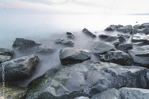 Minimalist sea and rock view with long exposure © Solidasrock