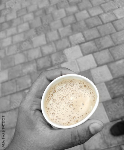 cup of coffee on wooden table