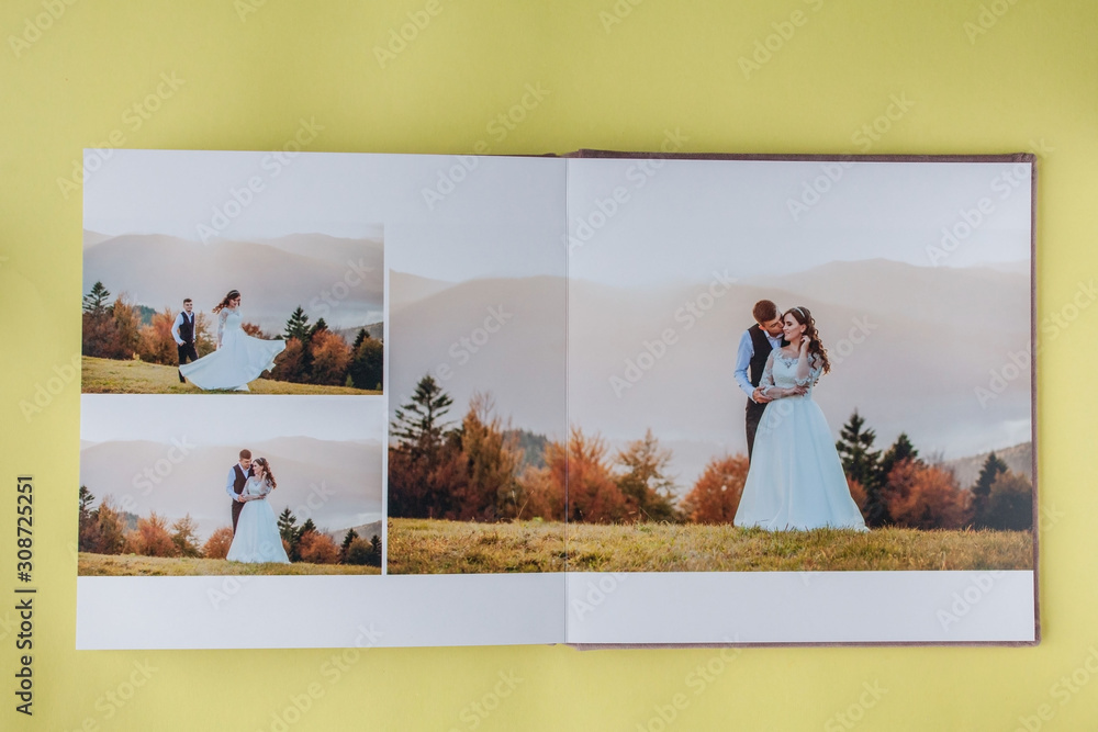 Luxury white leather wedding photo album and photo book - obrazy, fototapety, plakaty 