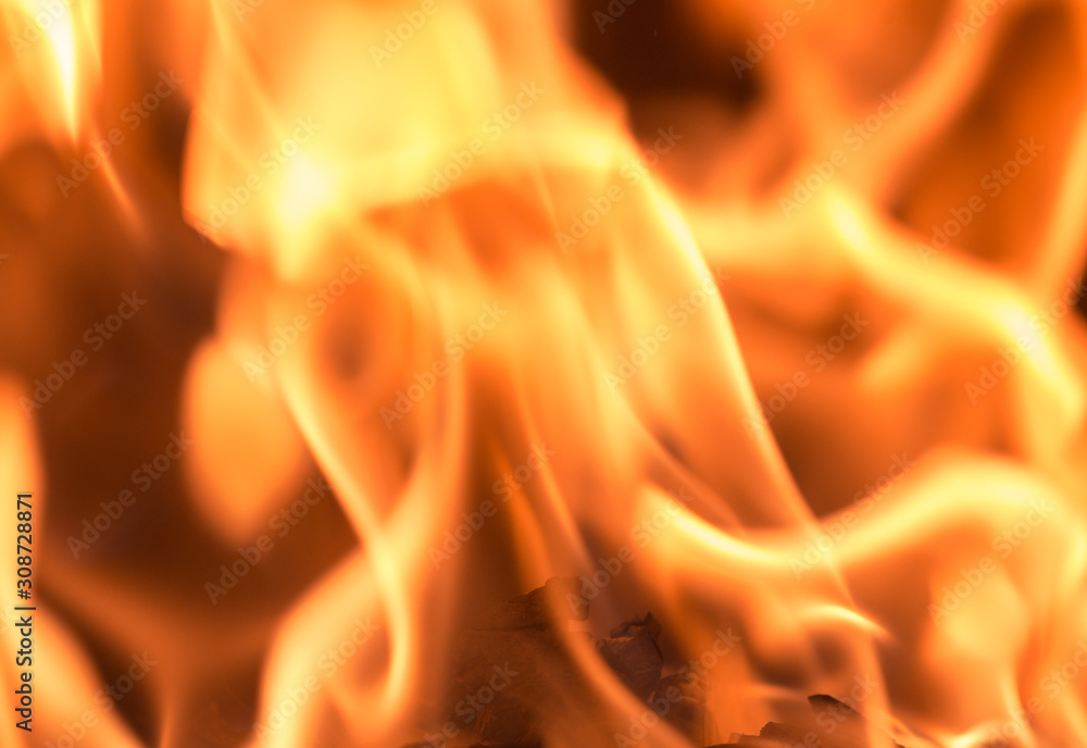 Fire flame burning glowing on black dark background, hot heat energy fuel fire motion pattern abstract texture. Fire flame burning glowing on black dark background, hot heat energy fuel fire motion pattern abstract texture.