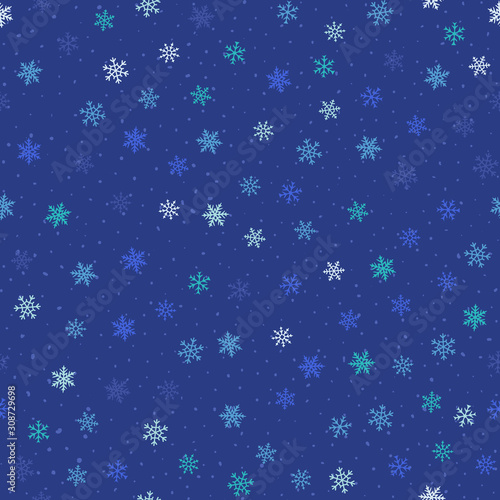 Winter seamless pattern. Blue Christmas and New Year background with small scattered snowflakes, dots. Elegant repeat vector texture. Festive winter holiday theme. Illustration on snowfall, blizzard