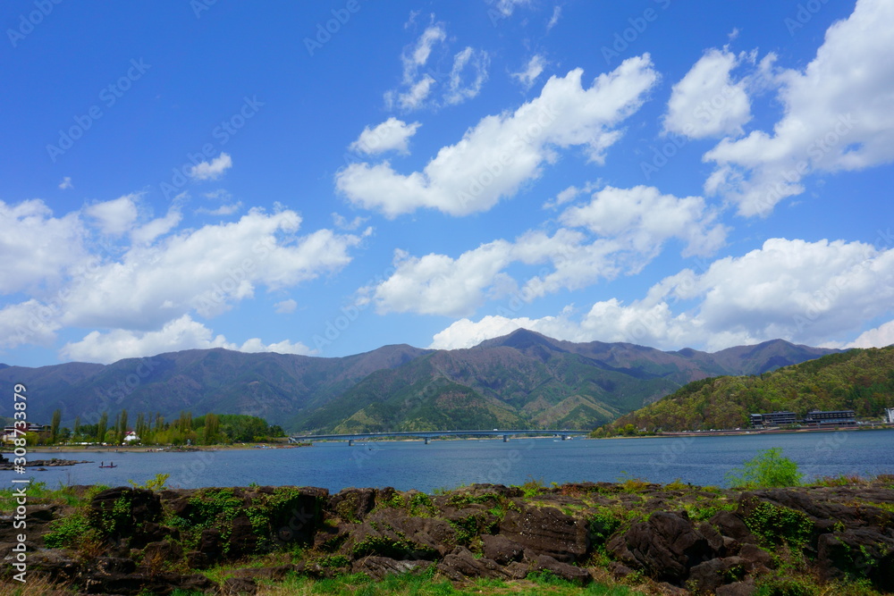 Landscape beautiful Lake Kawaguchiko. Blue sky and blue lake, mountains
