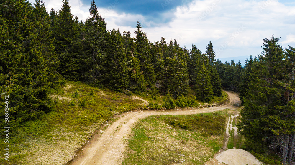 Fototapeta premium Aerial view from the heights of the road that runs through the Slovak Mountains