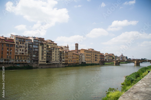 View over a bridge on Arno river at day. Florence, Tuscany, Italy. © snatalia