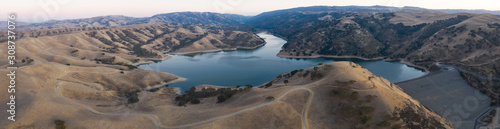 An aerial view shows the dry hills and reservoir near Pleasanton, California. Drought is affecting the entire state of California and wildfires are now common.