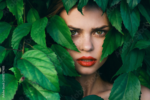 beautiful woman green leaves luxury of nature