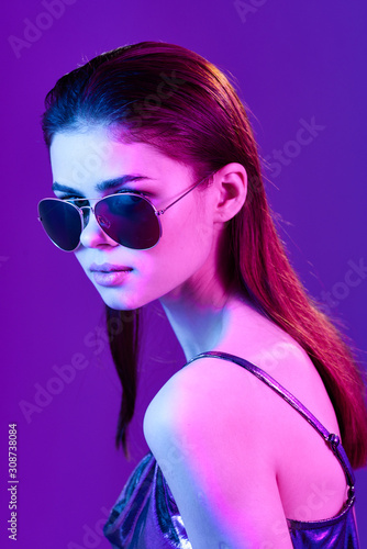 portrait of young woman in sunglasses