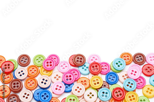 colored bright plastic buttons with a hole