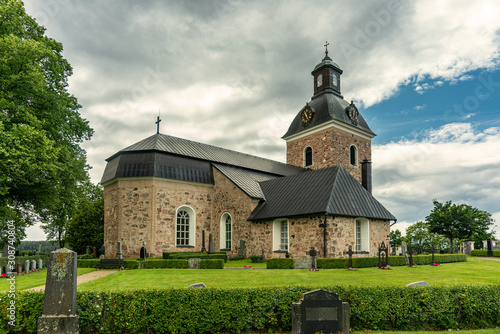 Beautiful church with cemetery in St.Skedvi in Sweden