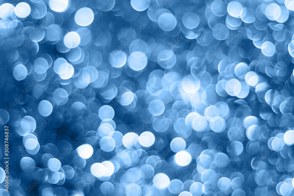 shiny glitter holiday beautiful abstract blur bokeh background in classic blue trendy color. Color of the year 2020. shiny glitter holiday beautiful abstract blur bokeh background in classic blue trendy color. Color of the year 2020.