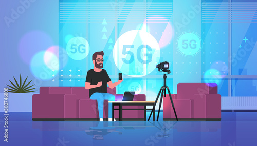 blogger recording video on camera 5G online network wireless systems connection concept fifth innovative generation of high speed internet modern apartment interior full length horizontal vector