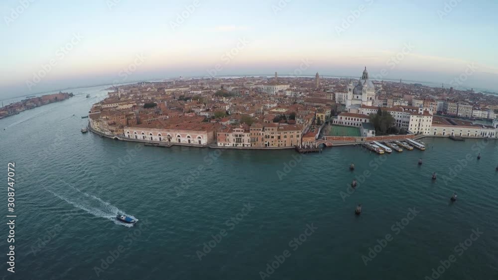 Wide Venetian canal at magic hour, tracking right Wide Venetian canal at magic hour, tracking right