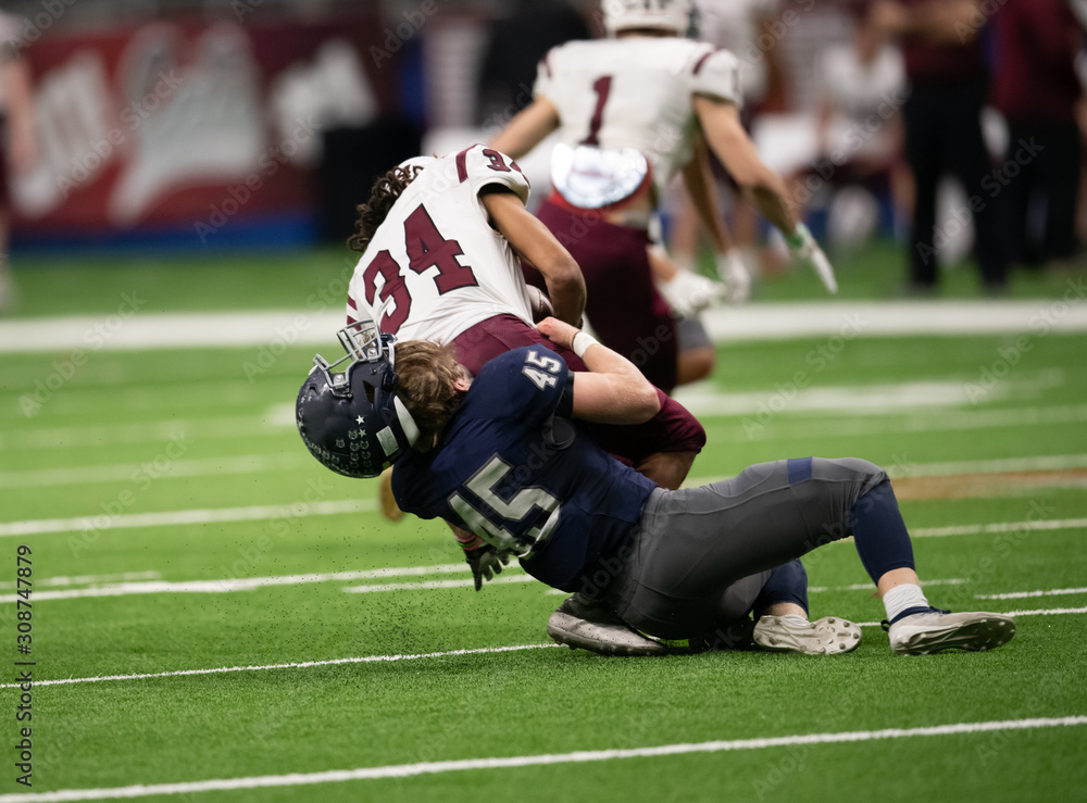 Great action photos of football players making amazing plays during a football game Great action photos of football players making amazing plays during a football game