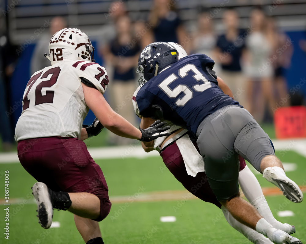 Great action photos of football players making amazing plays during a football game Great action photos of football players making amazing plays during a football game