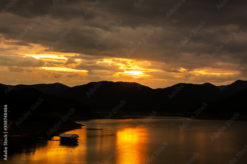 landscape of mountain lake at sunset