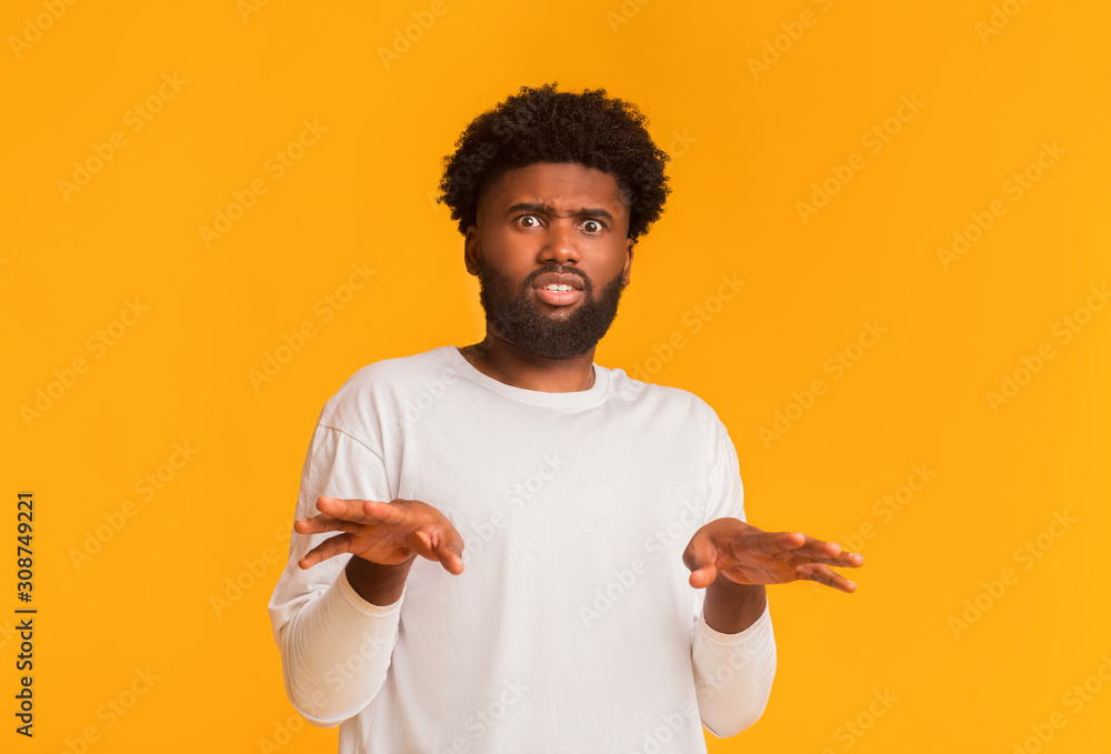 Disgusted african american guy portrait with squeamish expression Disgusted african american guy portrait with squeamish expression