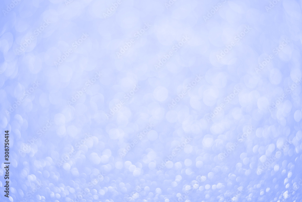Abstract christmas bokeh blurred blue lights background.