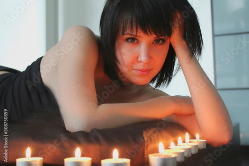 Young girl, bed, bedroom, view, hair, brunette, face, candles