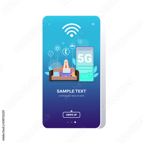 woman using laptop 5G online communication fifth innovative generation of internet connection concept girl sitting on sofa full length smartphone screen online mobile app copy space vector
