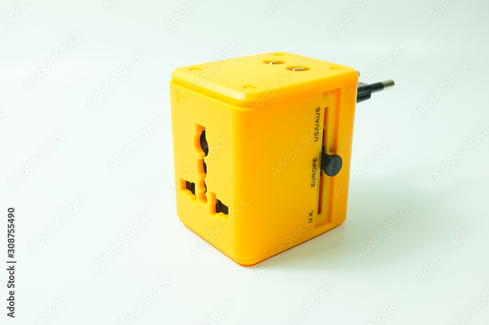 All in one universal international plug adapter isolated on white background. All in one universal international plug adapter isolated on white background.