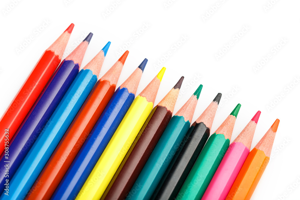 Colored pencils in a row on a white background, free space for text. Colored pencils in a row on a white background, free space for text.