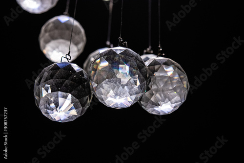 crystal light balls hanging on strings