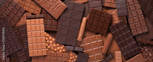 Bitter and milk chocolate background, sweet cocoa dessert.