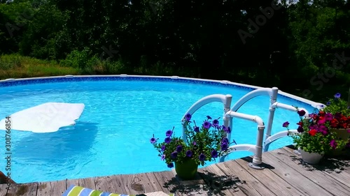 Splashing in a pool on a sunny day