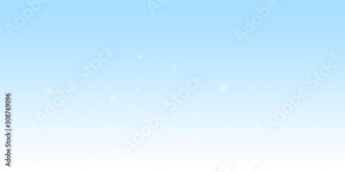 Sparse snowfall Christmas background. Subtle flyin