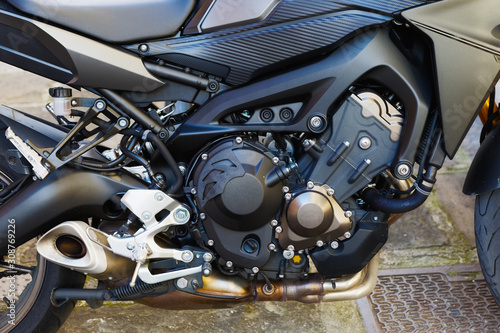 Closeup of motorbike engine on the street