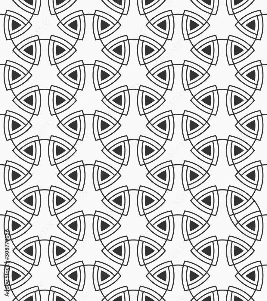 Geometric tiles with triple rounded elements and triangles.