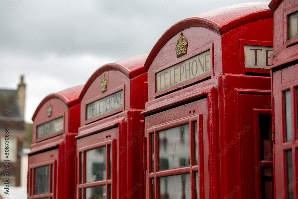 Red British phone boxes in cambridge, England Red British phone boxes in cambridge, England