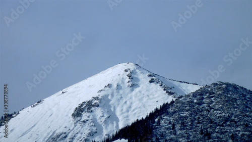 Winterlandschaft in den Alpen bei Sonne, Ftost und Schnee photo