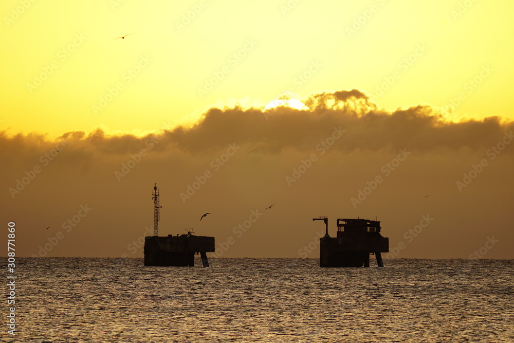sunrising on mediterrenean sea with shipyard sunrising on mediterrenean sea with shipyard