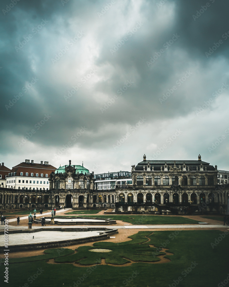 Fototapeta premium Dresdner Zwinger with dramatic sky. Dresden landmark. Travel and tourism in Dresden.