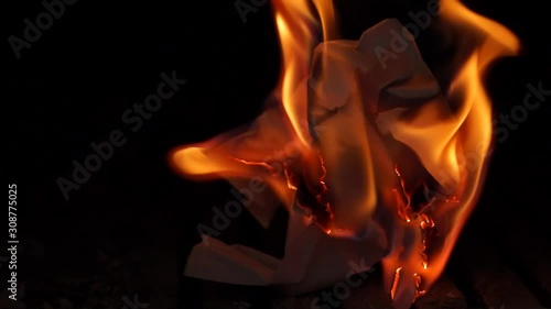 lit crumpled paper in the oven fire from the paper