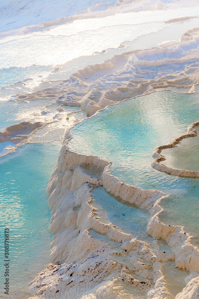 Turkey, Denizli Province, Pamukkale Natural Travertine Thermal Pools at sunset