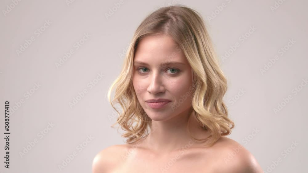 Gorgeous attractive caucasian brunette laughing and looking at camera. Perfect teeth. Gorgeous attractive caucasian brunette laughing and looking at camera. Perfect teeth.