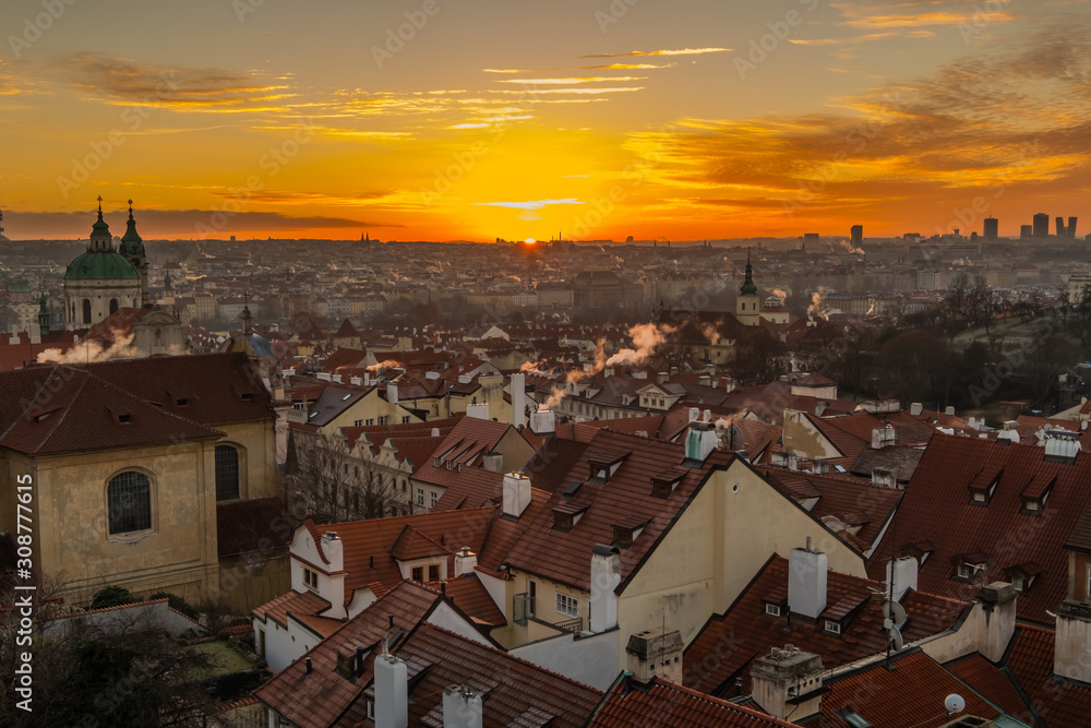 Dawn in Prague. Panorama of the city of Prague in a winter morning. The sun over Prague.