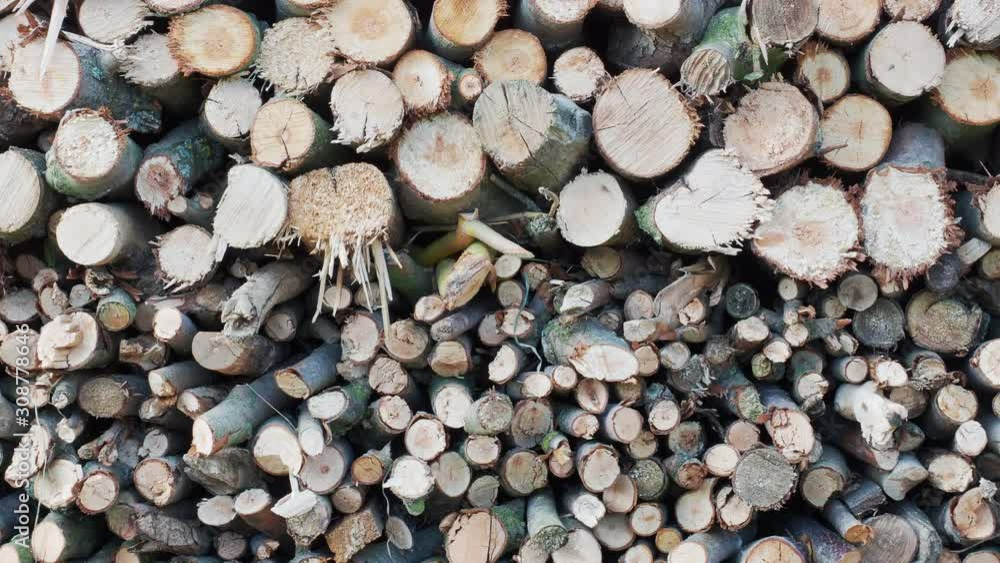 Stacks of firewood. Pile of firewood prepared for fireplace. Firewood background. Stacks of firewood. Pile of firewood prepared for fireplace. Firewood background.
