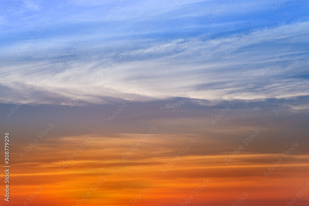 blue sky with clouds. orange sunrise or sunset